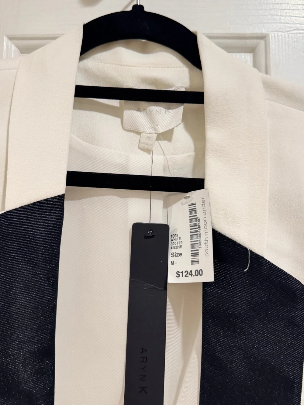 Crisp White Open-Front Blazer with Black Lapel Accents